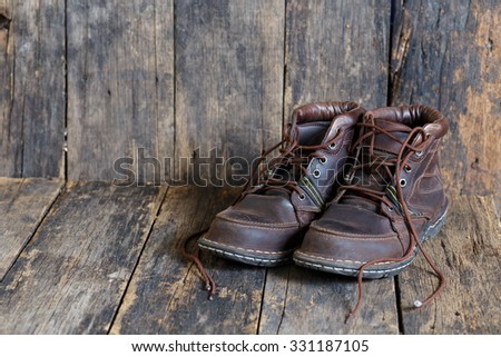 Leather shoes on the old wooden floor