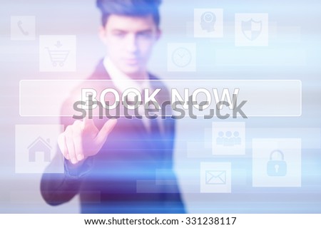 business, technology and internet concept - businessman pressing book now button on virtual screens