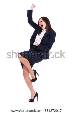 Businesswoman punching the air full of joy isolated on white background, expressing success