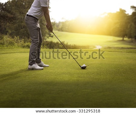 Man playing golf Royalty-Free Stock Photo #331295318
