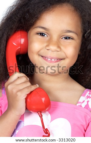 adorable girl speaking on the telephone a over white background