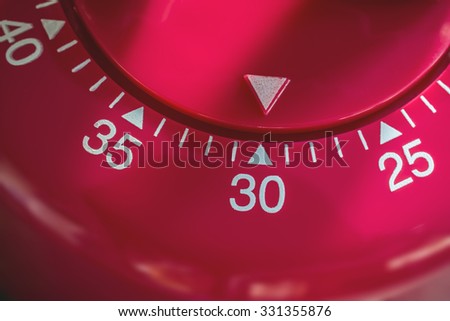 Closeup Of A Kitchen Egg Timer - 30 Minutes Royalty-Free Stock Photo #331355876