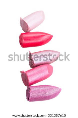 set of multicolored lipsticks isolated on white background