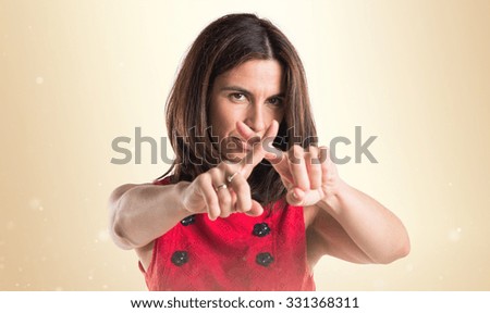Woman making stop sign