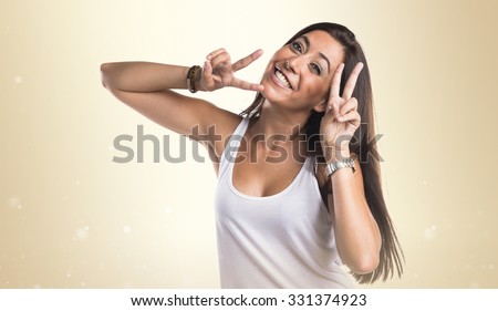 Woman doing victory gesture