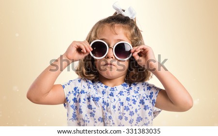 Kid with sunglasses