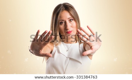 Woman making stop gesture