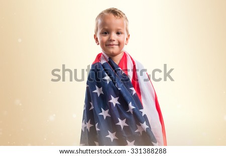 Kid holding an american flag