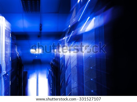 rows of server hardware with blue backlight