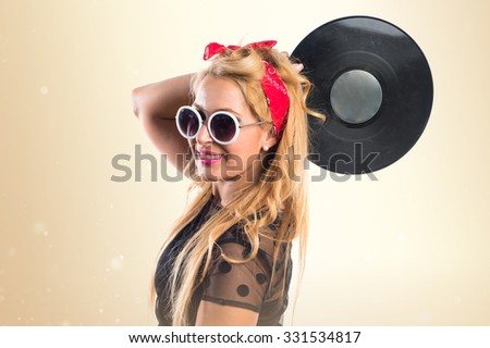Pin-up girl holding a vinyl