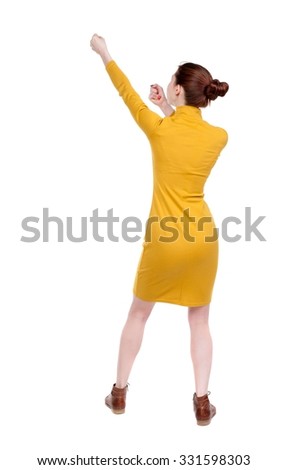 back view of standing girl pulling a rope from the top or cling to something. girl  watching. Rear view people collection.  backside view of person.  Isolated over white background.