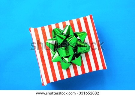 Christmas present isolated on blue background