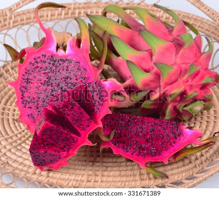 Dragon Fruit on wooden background.