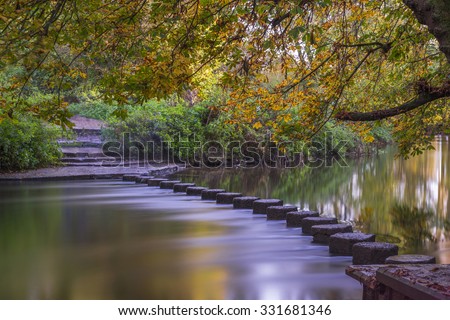 Stepping Stones over the river Mole at the foot of Box Hill, Surrey, UK Royalty-Free Stock Photo #331681346