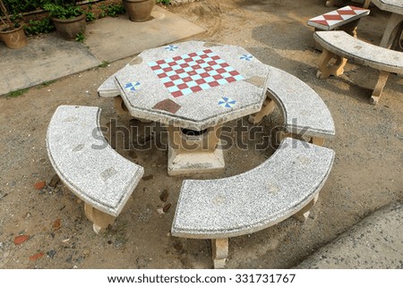 Stone Garden Table and four chairs.