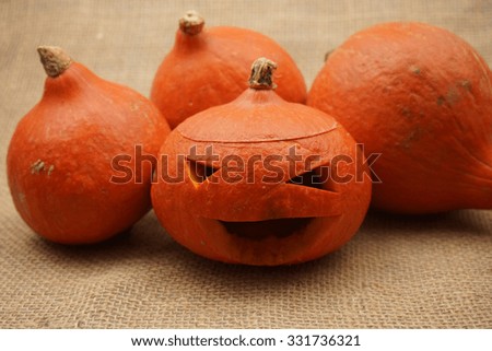 Halloween pumpkin and hot peppers