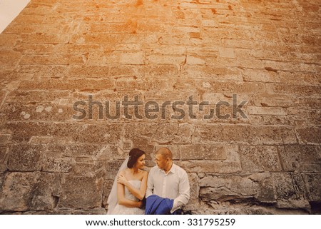 beautiful young couple in wedding sunny summer day