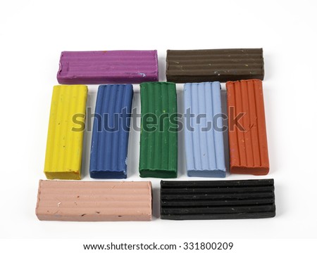  colorful plasticine blocks on white