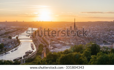 Panorama of the city of Rouen at sunset with the cathedral and the Seine Royalty-Free Stock Photo #331804343