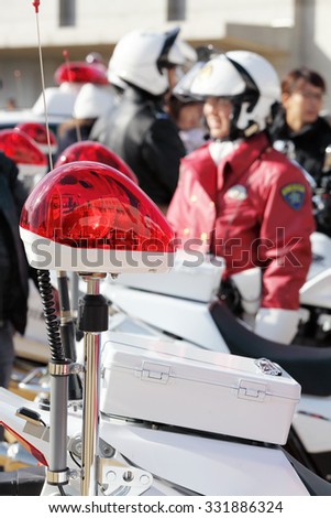 policewoman's motorcycles with red lamp