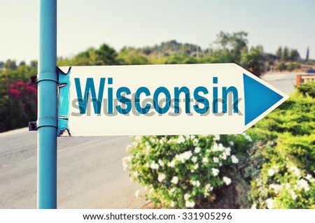 Wisconsin Road Sign with beautiful nature and road on background. United States of America