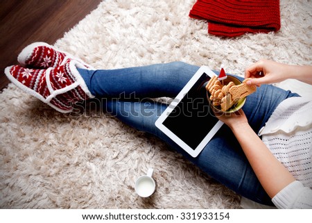 Woman eating biscuits