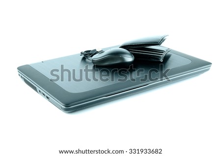Wallet on laptop on white background