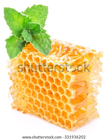 Honeycomb and mint on a white background.  High-quality picture.