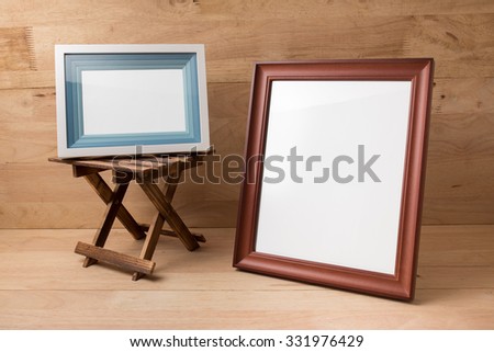 Blank  Photo Frame on wood background