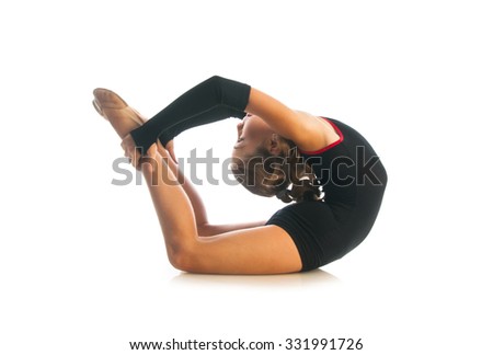 Girl doing gymnastic exercise isolated on white background