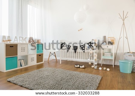 Picture of cosy and light baby room interior