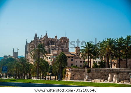 Cathedral of Palma de Mallorca viewed from road. Big gothic church on the sea shore. Beautiful travel picture of Spain.