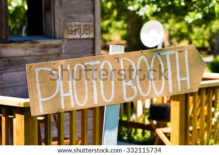 Photobooth sign outdoors at a wedding reception in Oregon. Royalty-Free Stock Photo #332115734