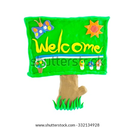 Welcome signboard made from plasticine green isolated on white.
