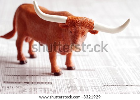 A bull on a financial newspaper