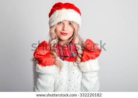 Christmas smiling Woman. Beauty Model Girl in Santa Hat