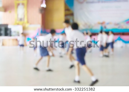 blur of student playing  in school