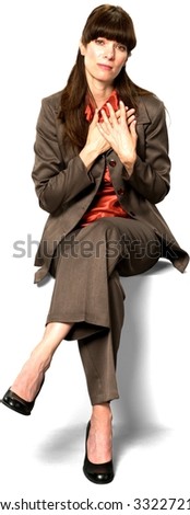 Embarrassed Caucasian woman with long dark brown hair in business formal outfit begging - Isolated