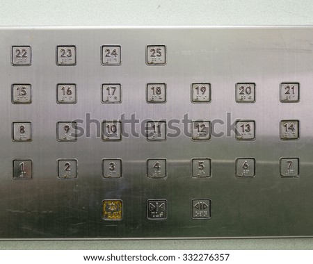 Close-up view of elevator internal buttons control panel with Braille numbers, code. Elevator Interior