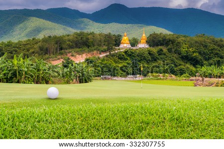golf ball on green. Royalty-Free Stock Photo #332307755