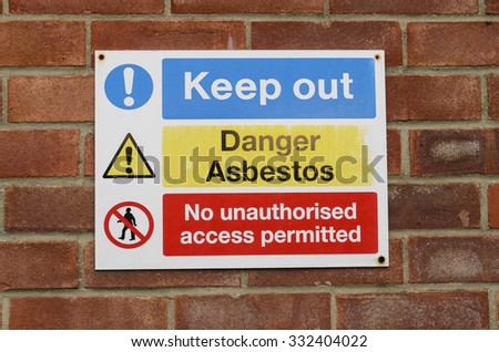 A danger sign for asbestos hazard keep out, England UK.