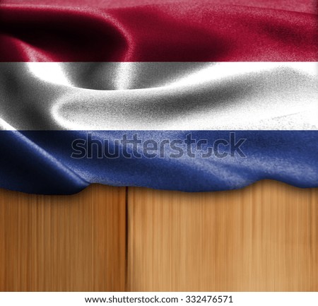 Netherlands flag on wood Texture
