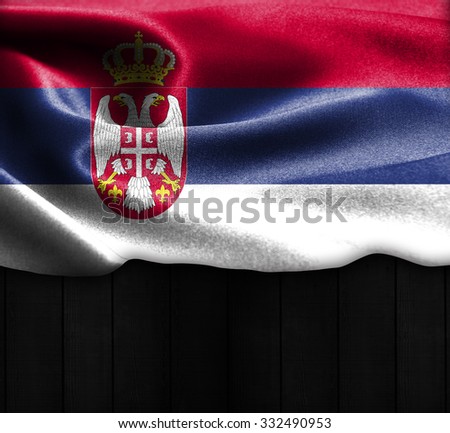 Serbia flag on wood Texture