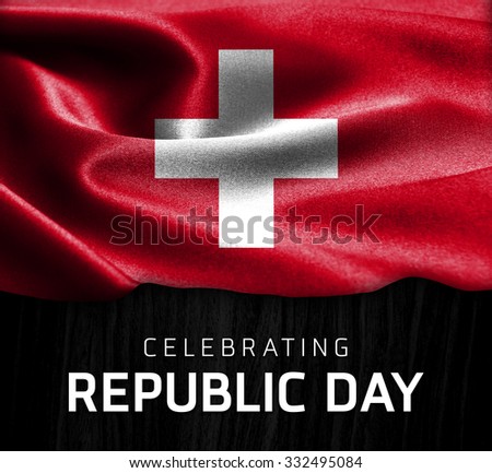 Switzerland flag and Celebrating Republic Day Typography on wood background