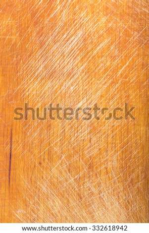 Old worn out cutting board with flour and dough residues. Background texture.