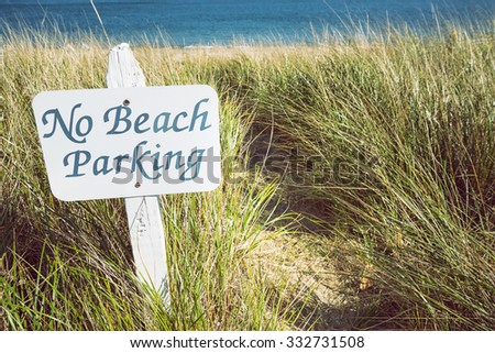 No parking sign on the beach. Environmental concept.