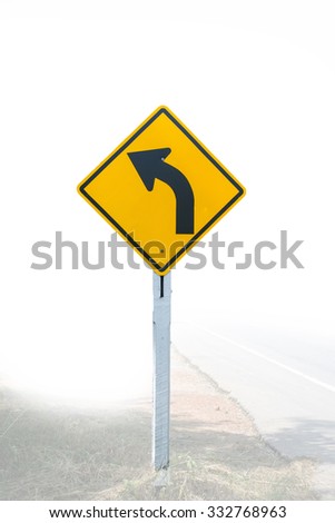 Traffic Signs on the road in the fog day 
