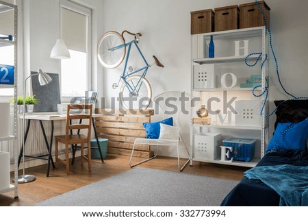 Small blue studio for creative young person Royalty-Free Stock Photo #332773994