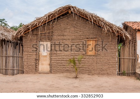 Typical mud house of the poor regions of the countryside of Brazil Royalty-Free Stock Photo #332852903