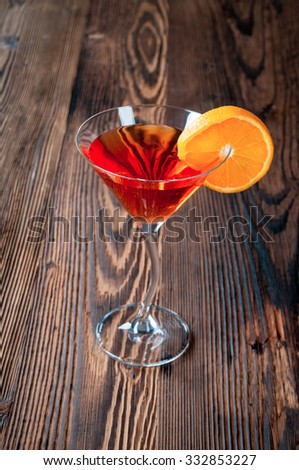 Made Spritz with aperol, soda and prosecco on wooden background